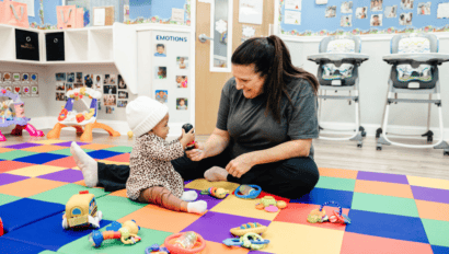 Teacher and child at The Growing Years Cary five-star rated child care center in Cary, NC